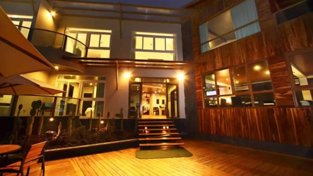 Exterior of Iguana Crossing Boutique Hotel with modern design and ocean views in Puerto Villamil.
