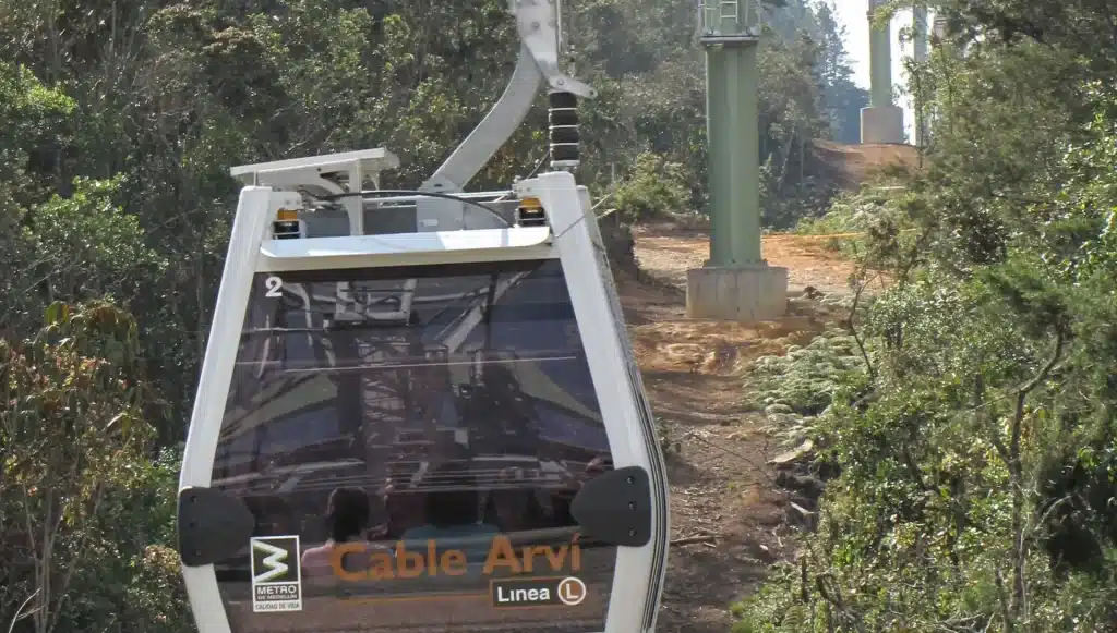 Metrocable gondola arriving at Parque Arví station, Medellín, Colombia